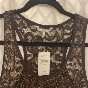 Buckle see through tank tops.